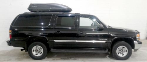 Yukon XL (4 wheel drive) SUV with trailer, and carrier